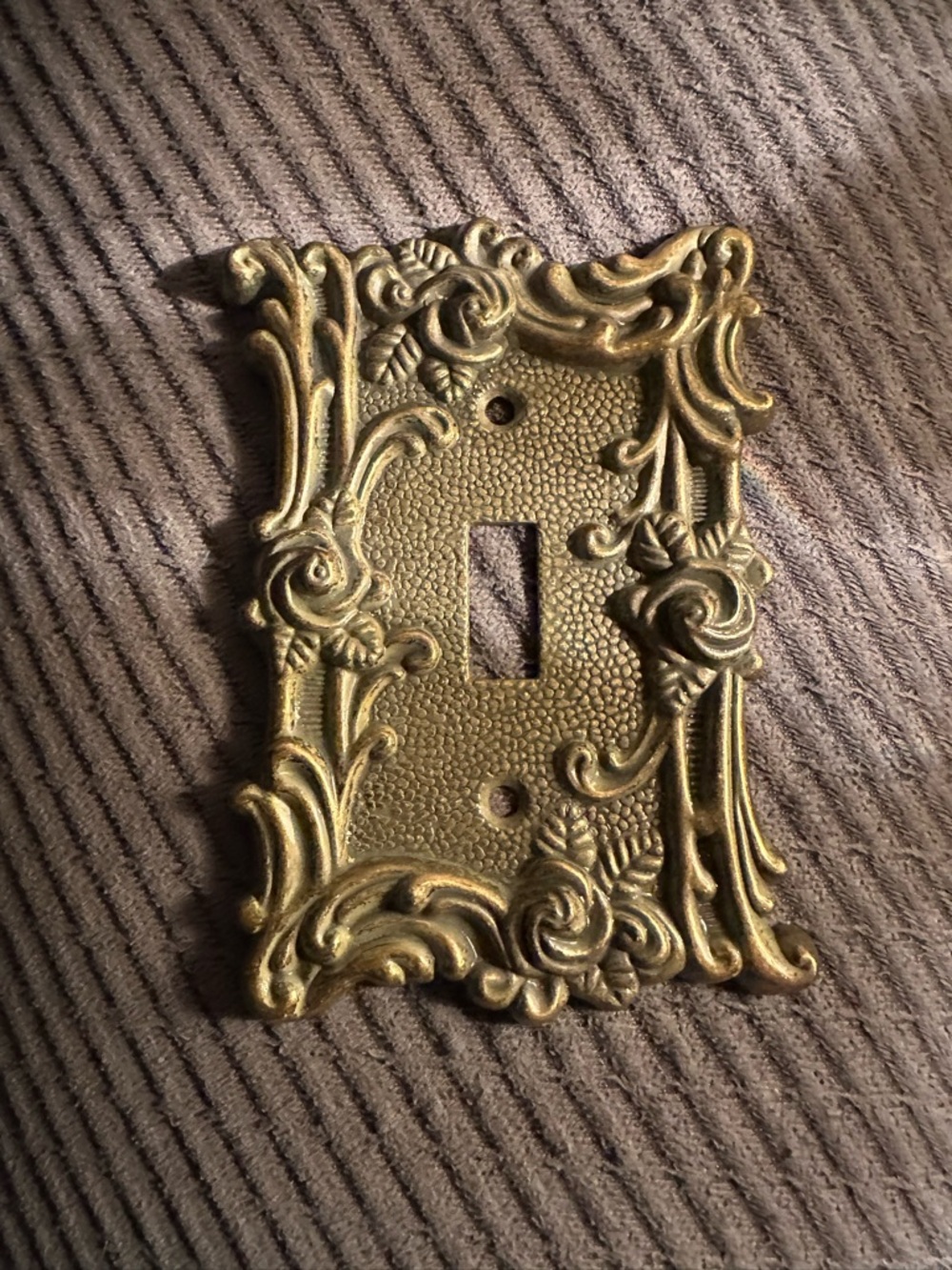 Decorative Single Toggle Switch Plate - Gold Finish. Might be solid Brass